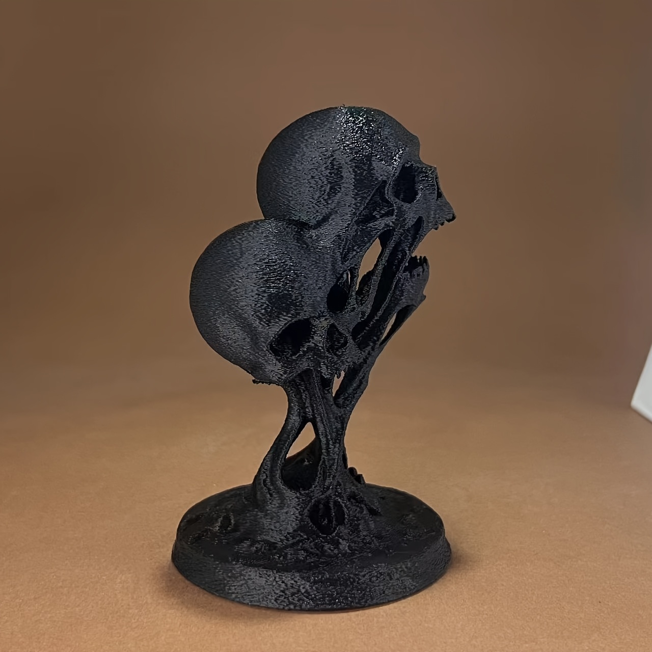تمثال جمجمة مذابة على الطراز ا - مراجعة 3D Printing Household Items وسعره